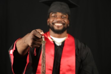 Graduation portrait with tassel.