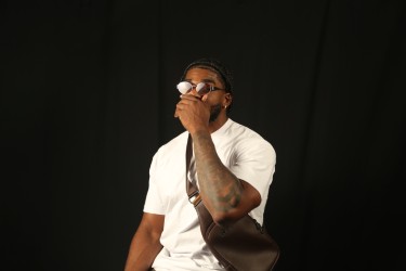 Bag, glasses, confidence.